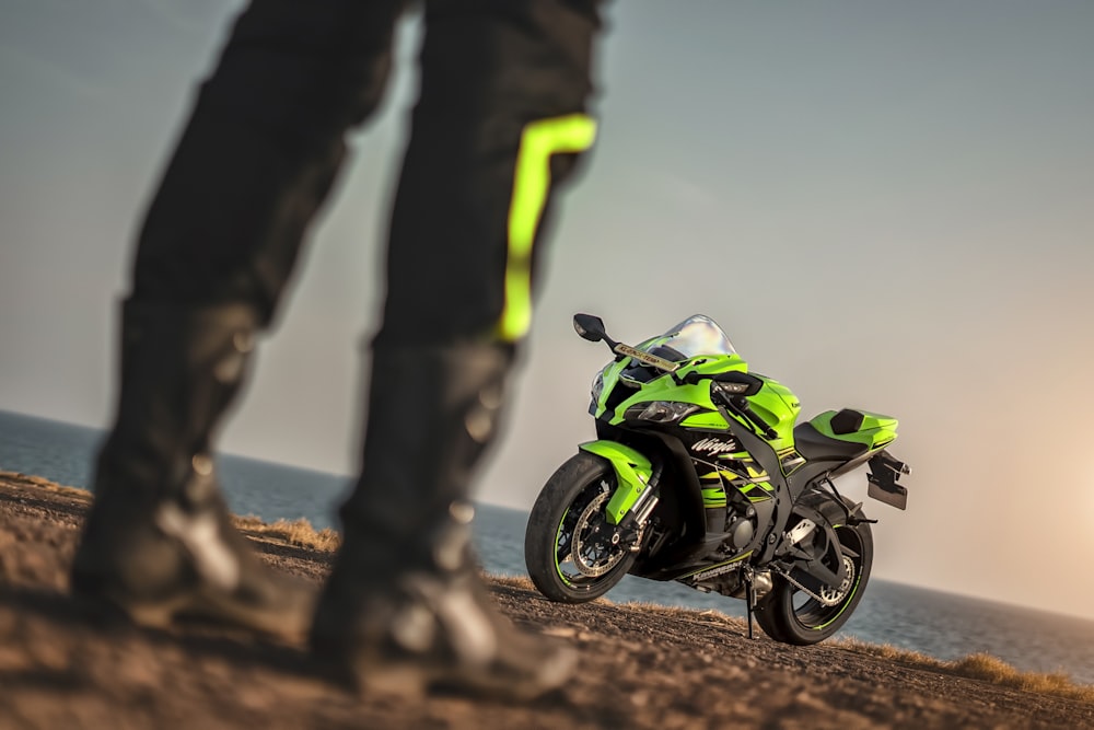 green and black sport bike