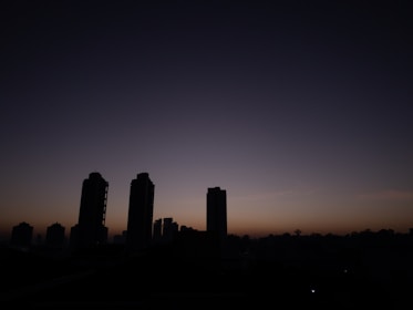 A city skyline at dawn symbolizing progress and advanced ventures.