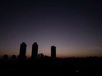 A city skyline at dawn symbolizing progress and advanced ventures.