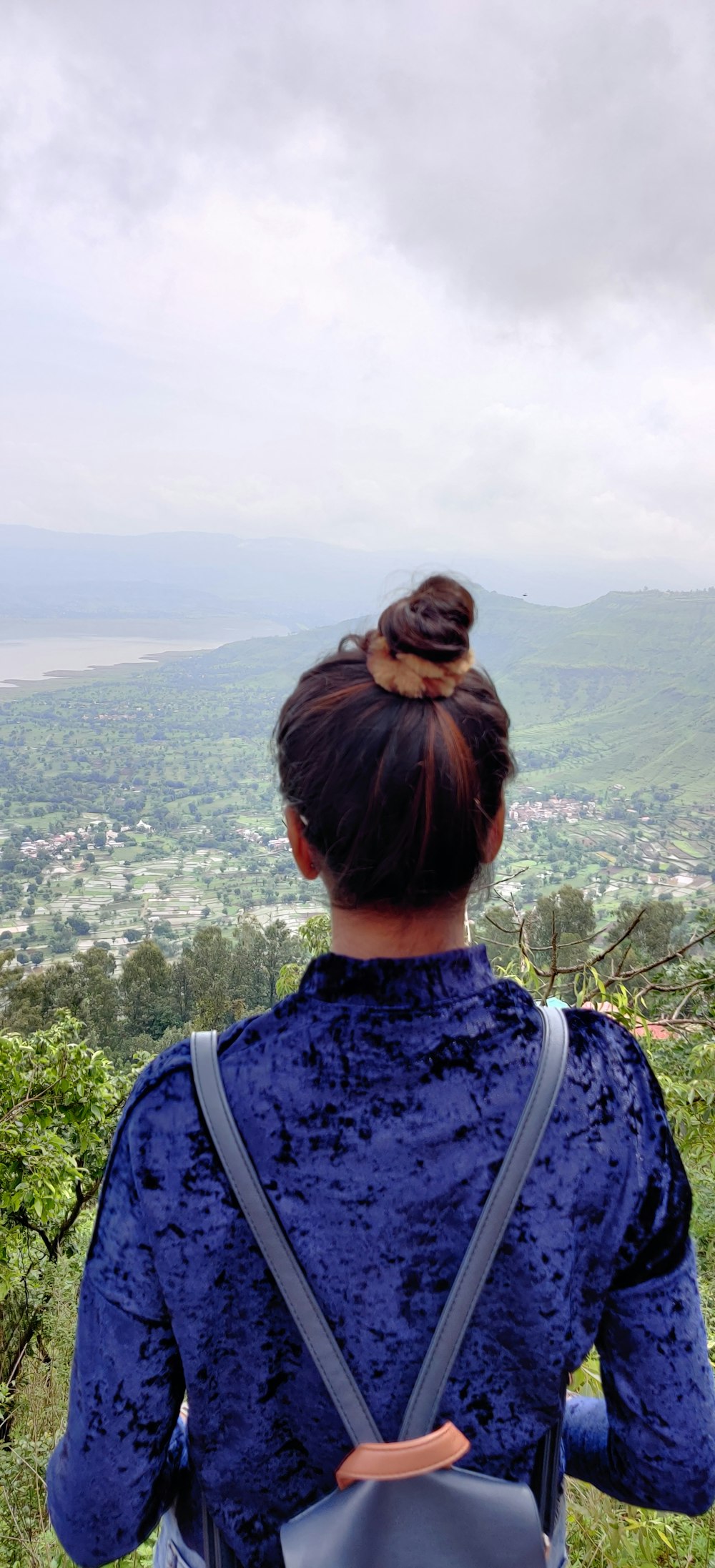 woman overlooking cityscape