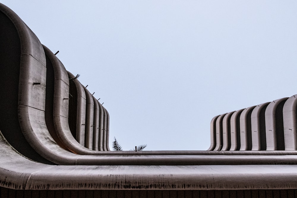 architecture photography of gray concrete column