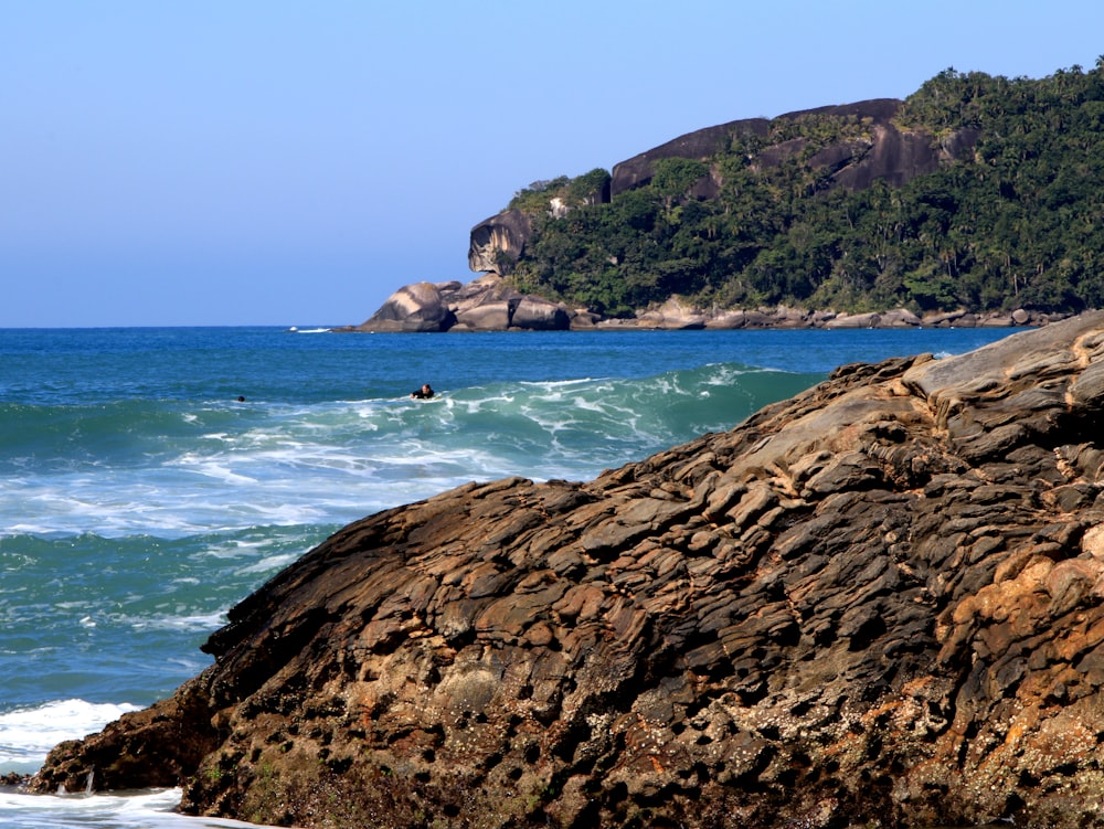 body of water near mountain