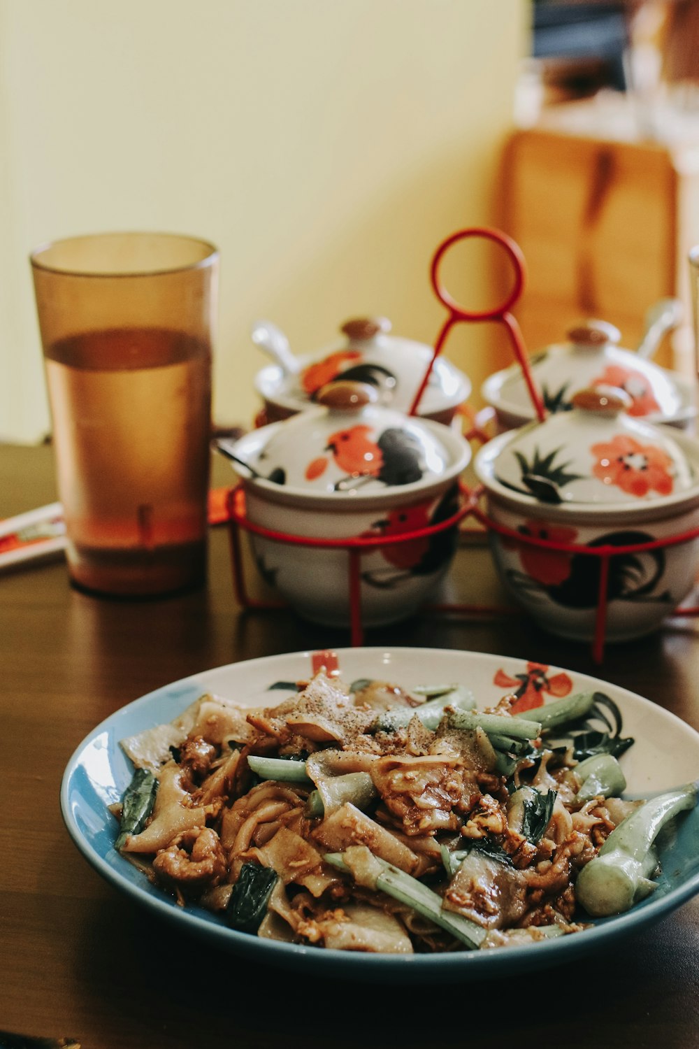 a plate of food on a wooden table