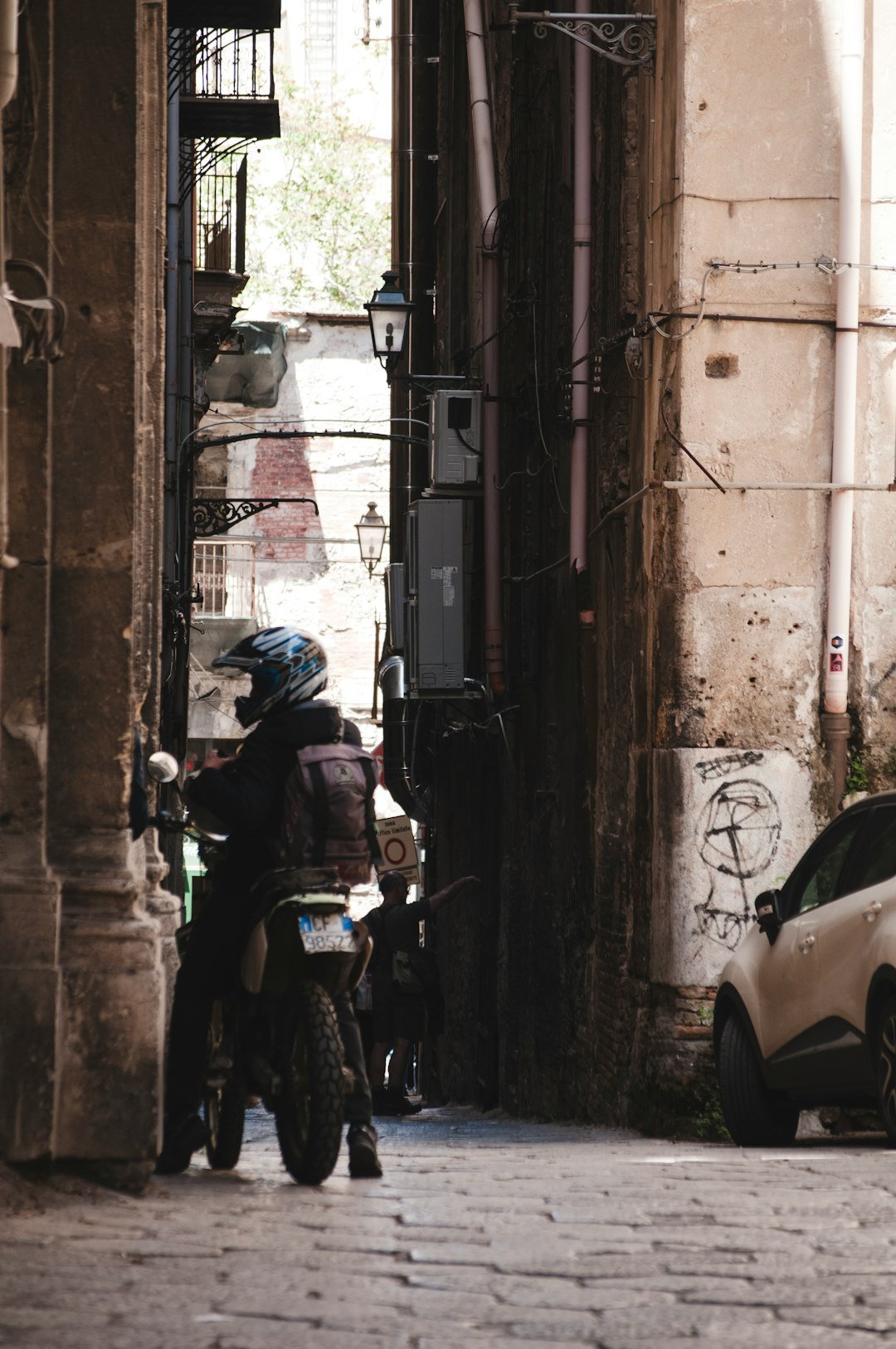 man riding on motorcycle