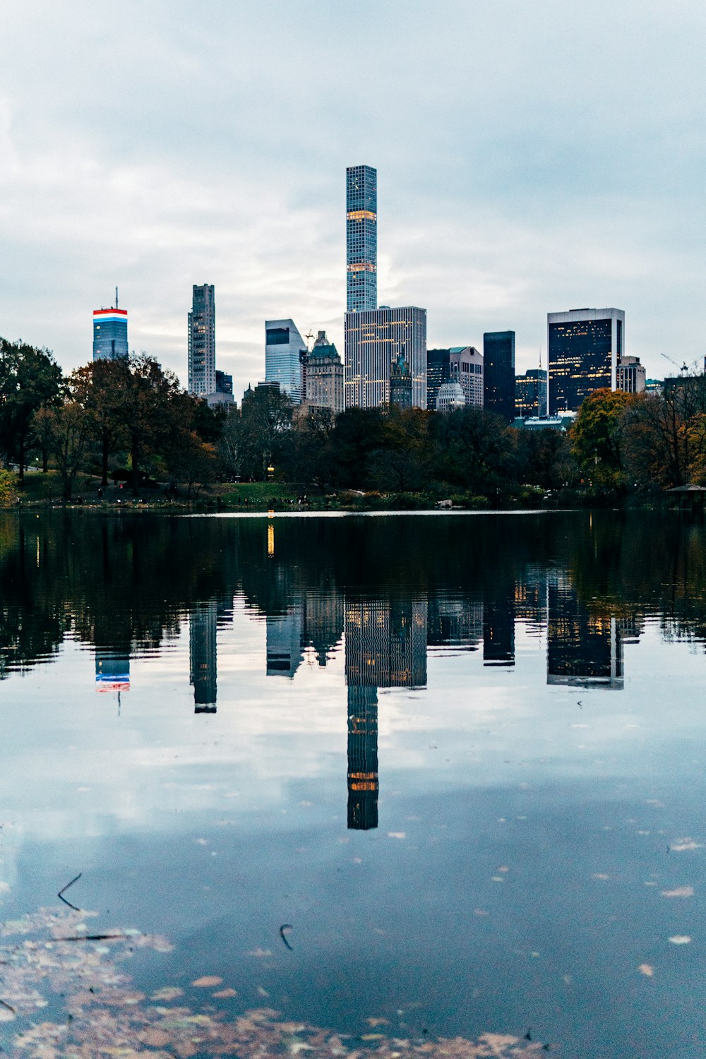 reflective photography of high-rise building