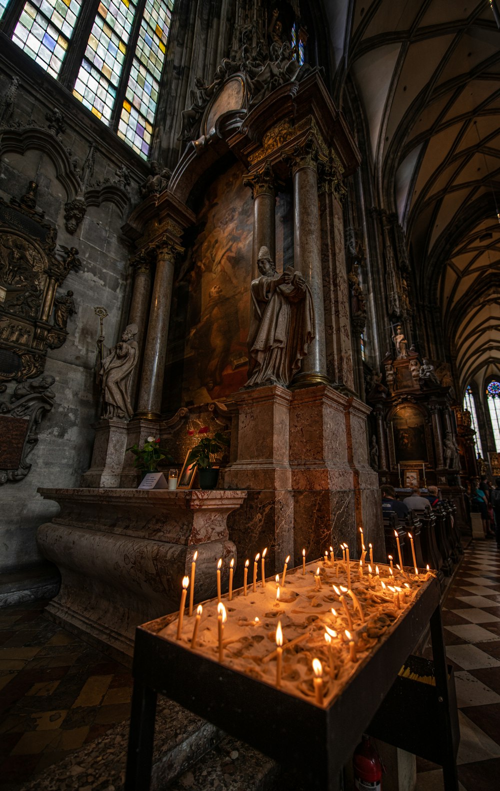 brown wooden table with candles