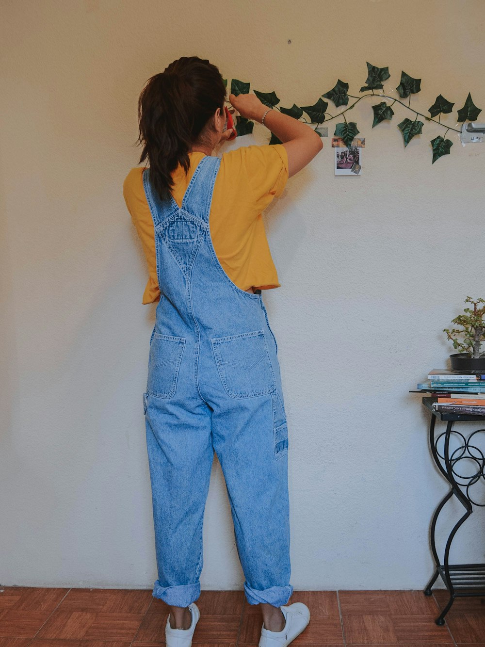 woman standing in front of wall