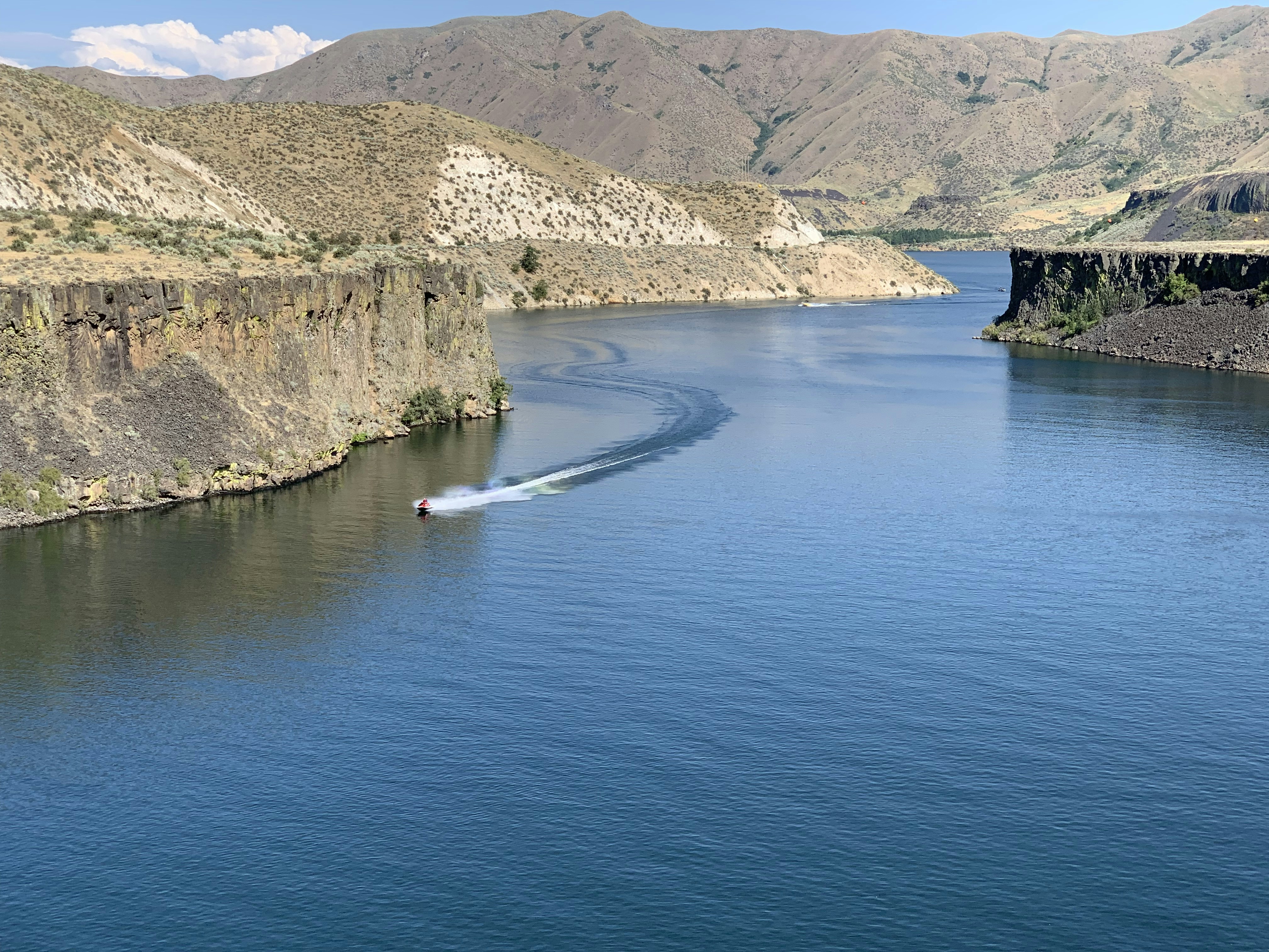 a large body of water surrounded by mountains