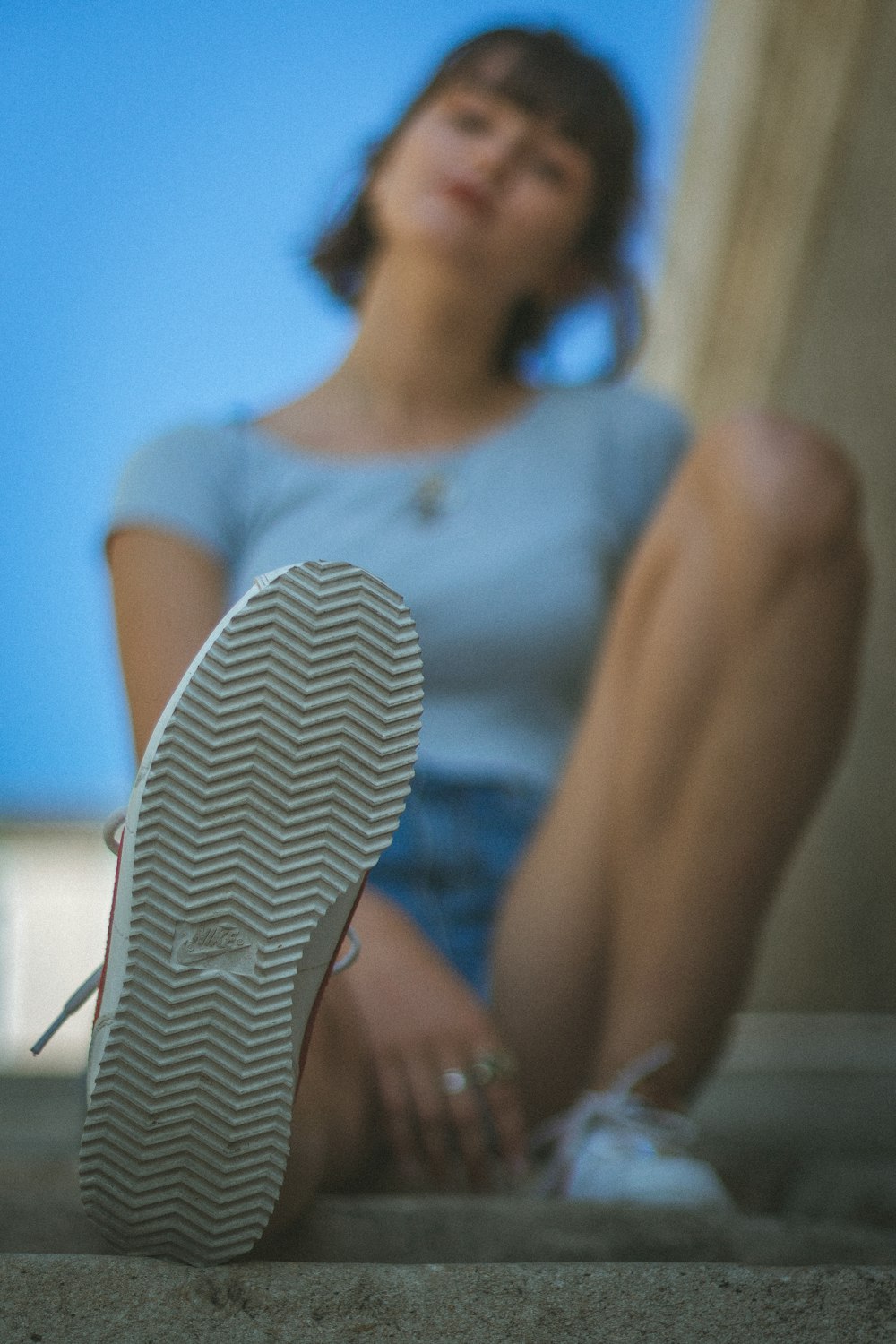 woman sitting on stairs