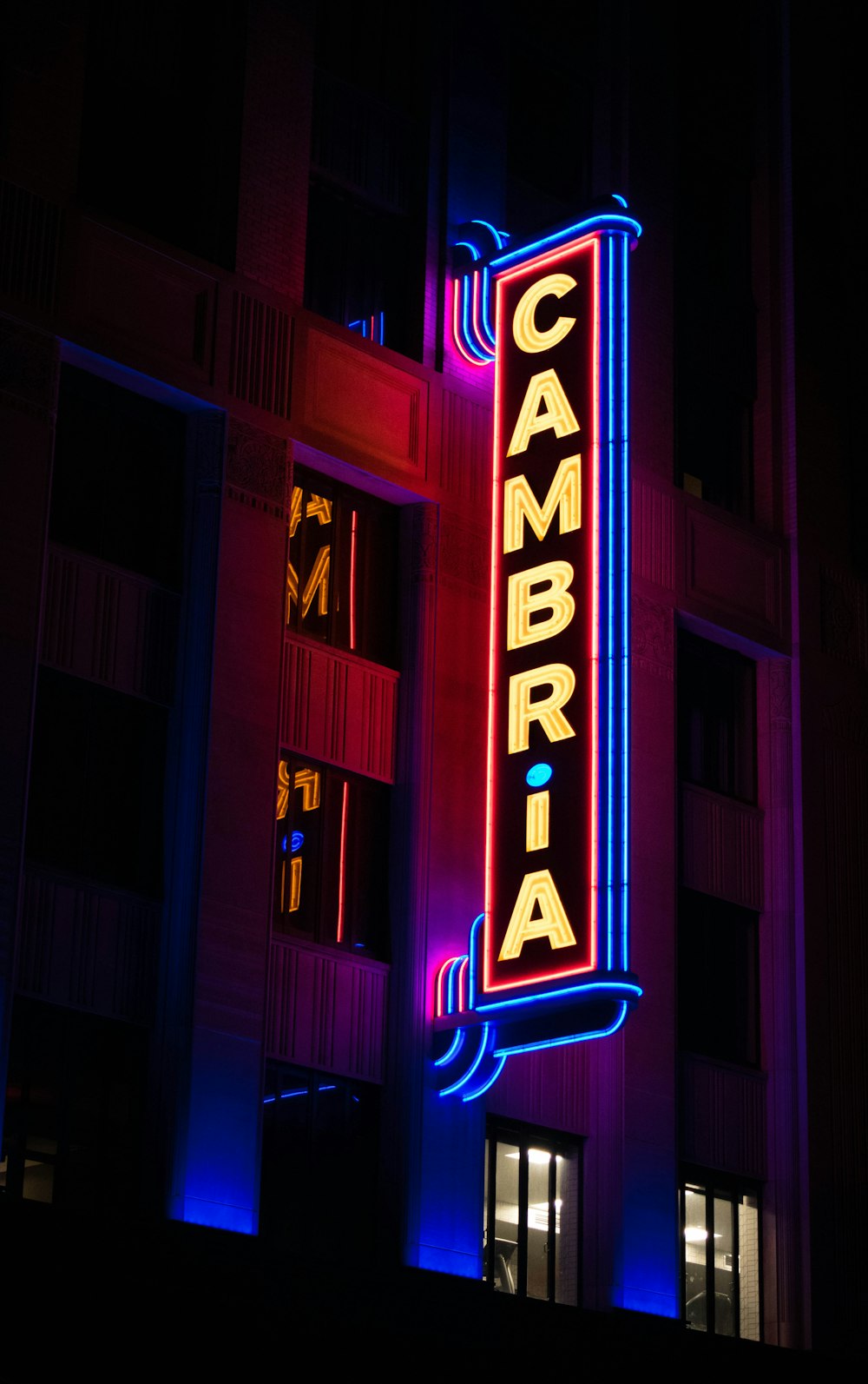 lighted Cambria signage at night