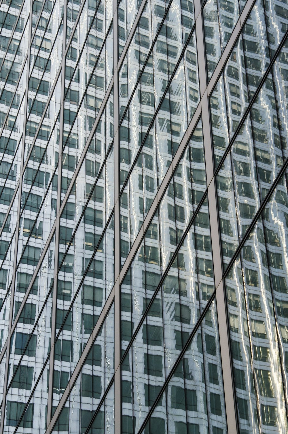 white and gray building windows