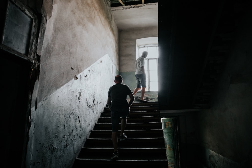 2 men going upstairs