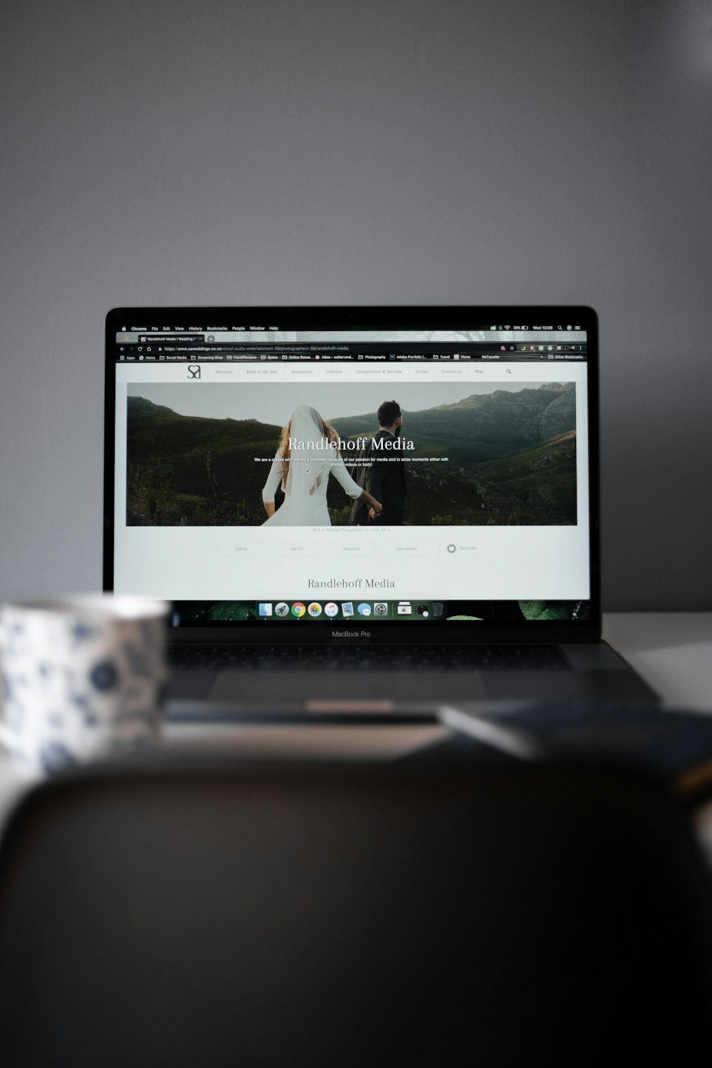 a laptop computer sitting on top of a desk