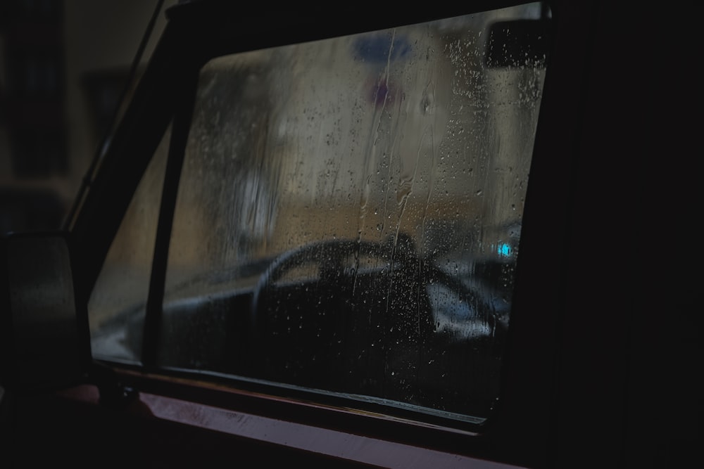 a car window with rain drops on it
