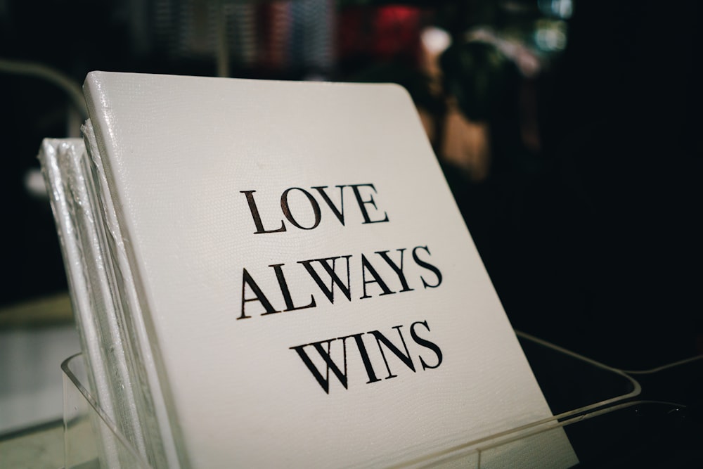 love always wins book in box