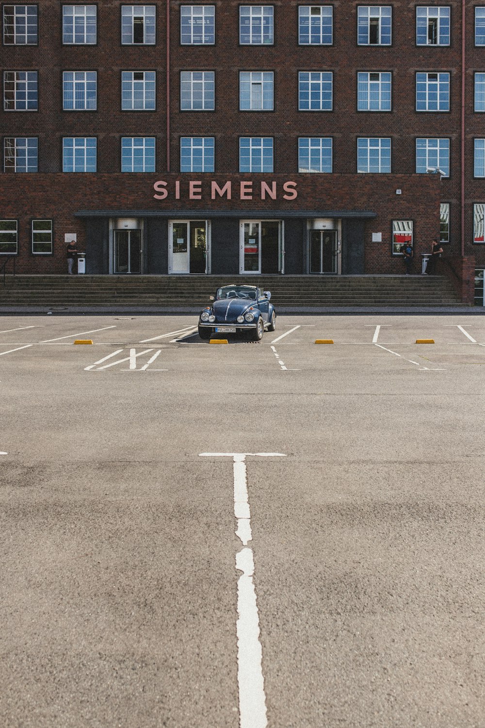 parked car in front on building