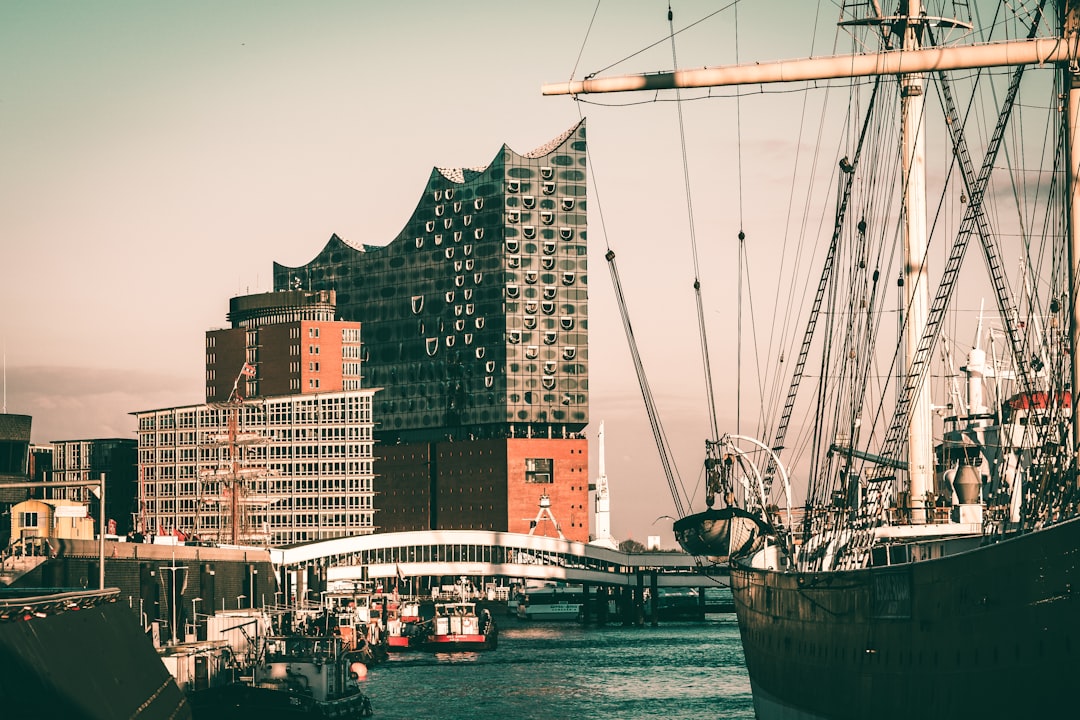 crane beside buildings and bridge