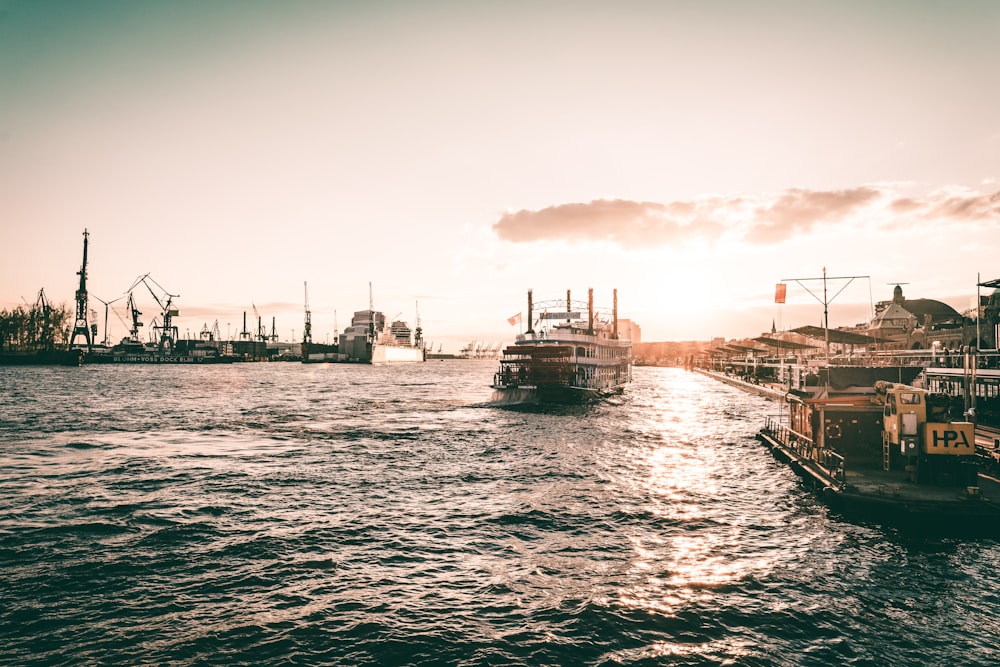 black and gray ships on body of water