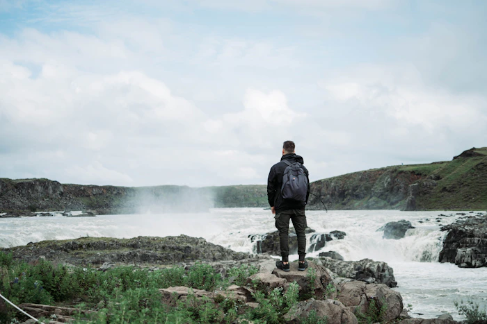 Dark technical outerwear in wet conditions
