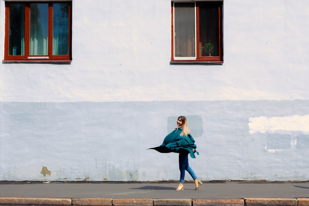 women standing near building