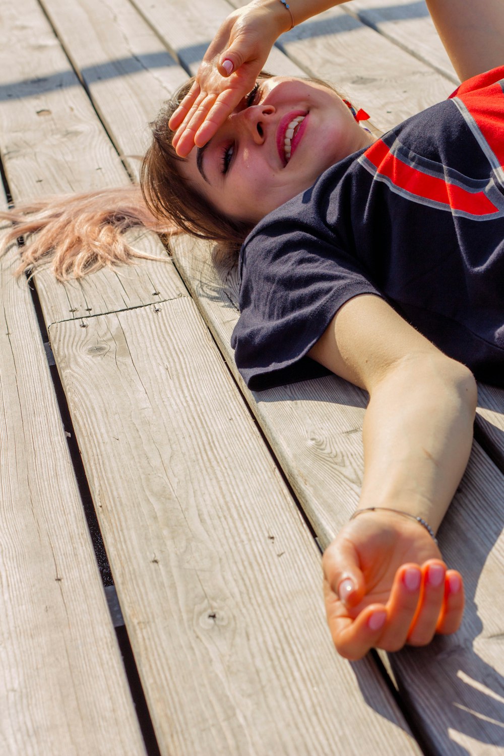 woman lies on floor