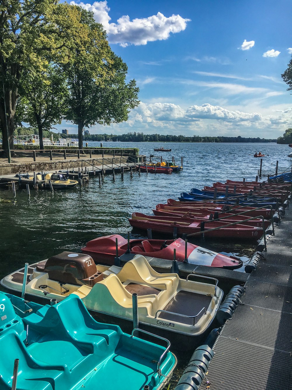 bunch of kayaks near dock