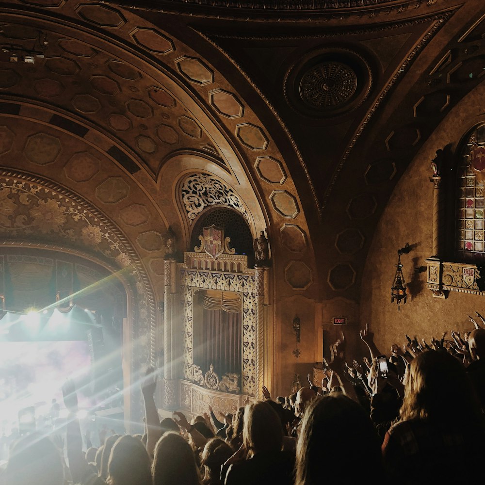 a large crowd of people in a building