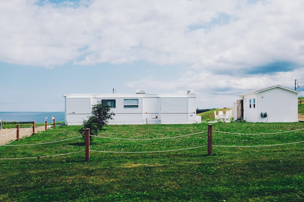 white shed near sea