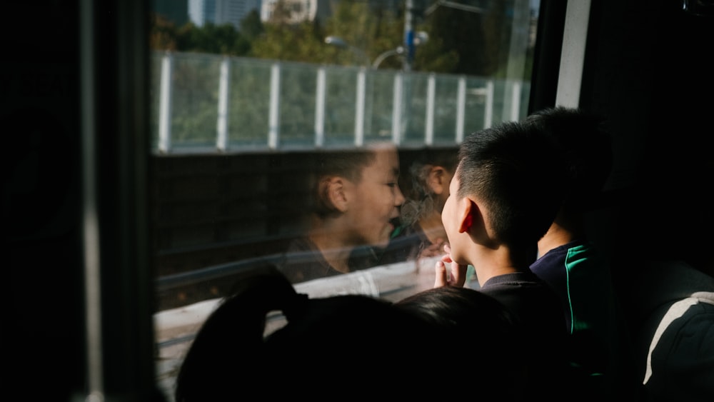 boy's on window