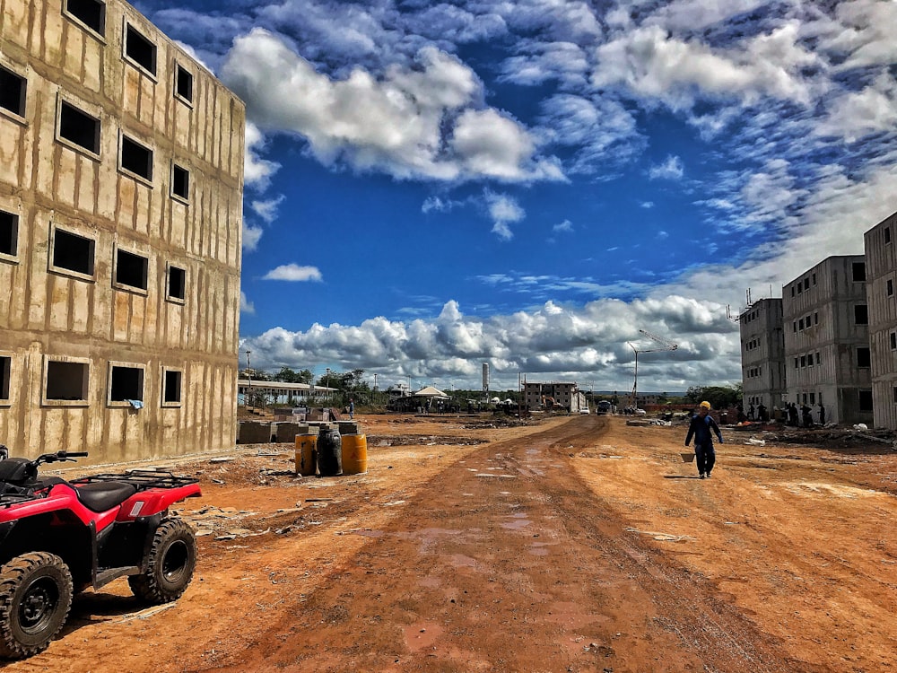 red ATV near building