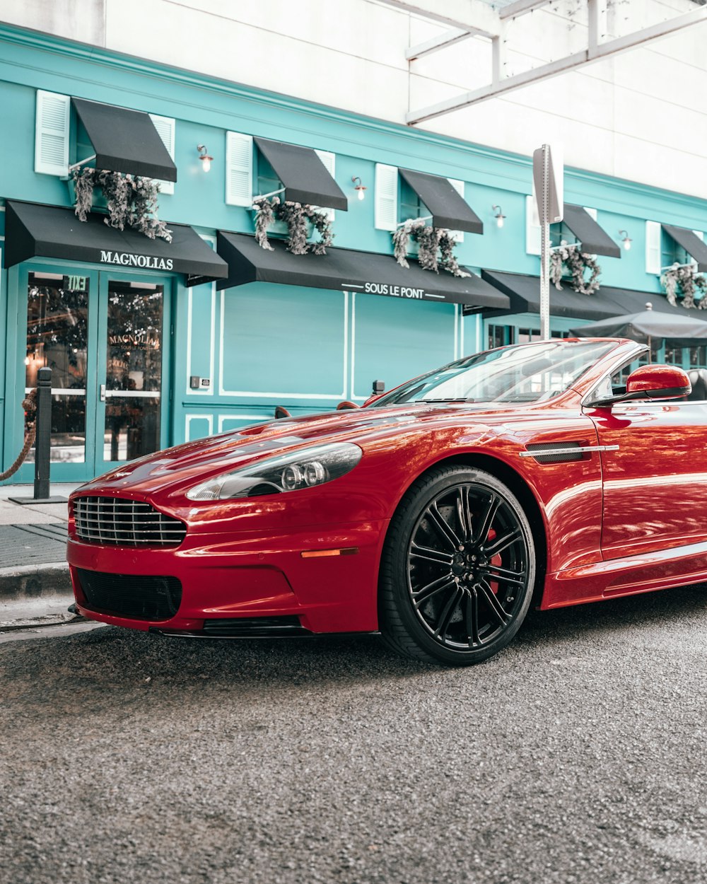 parked red coupe