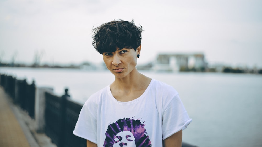 man wearing white scoop-neck blouse