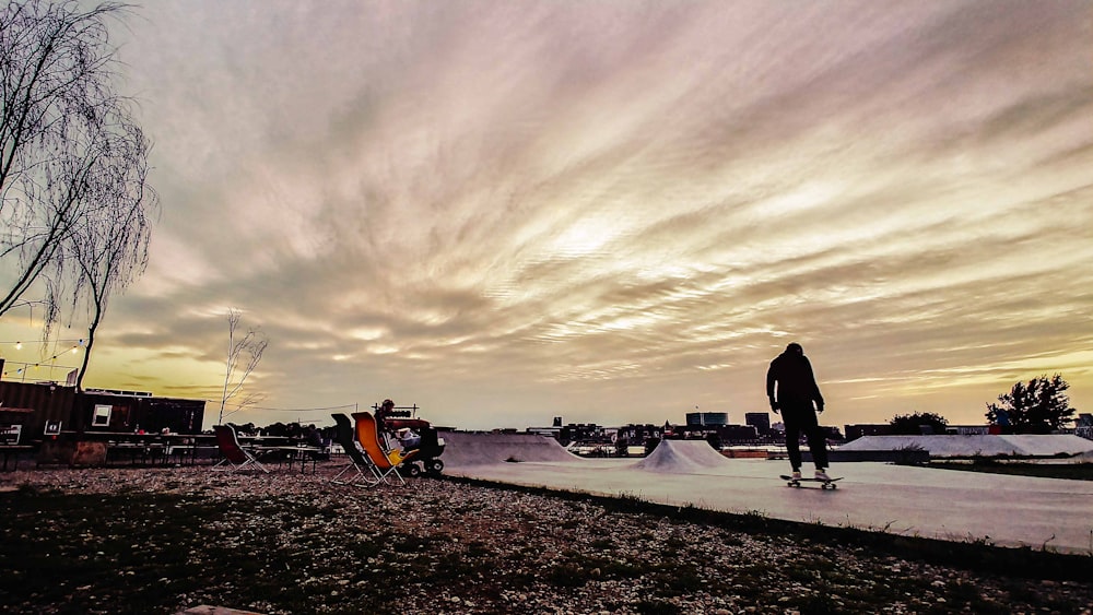 person on skateboard during daytime