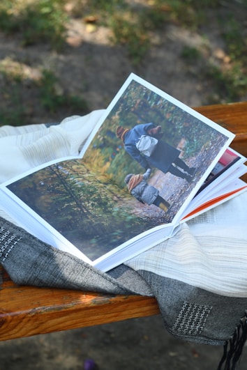 a picture of a couple sitting on a park bench