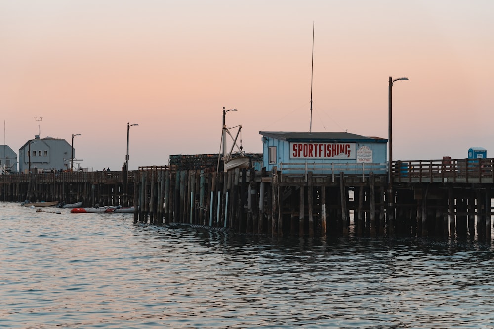 blue Sport fishing wooden house on dock