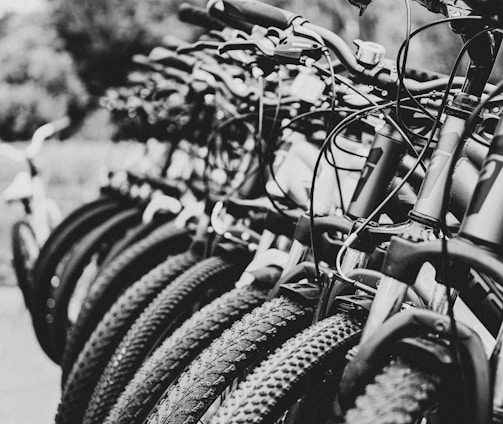 greyscale photography of parked bicycle