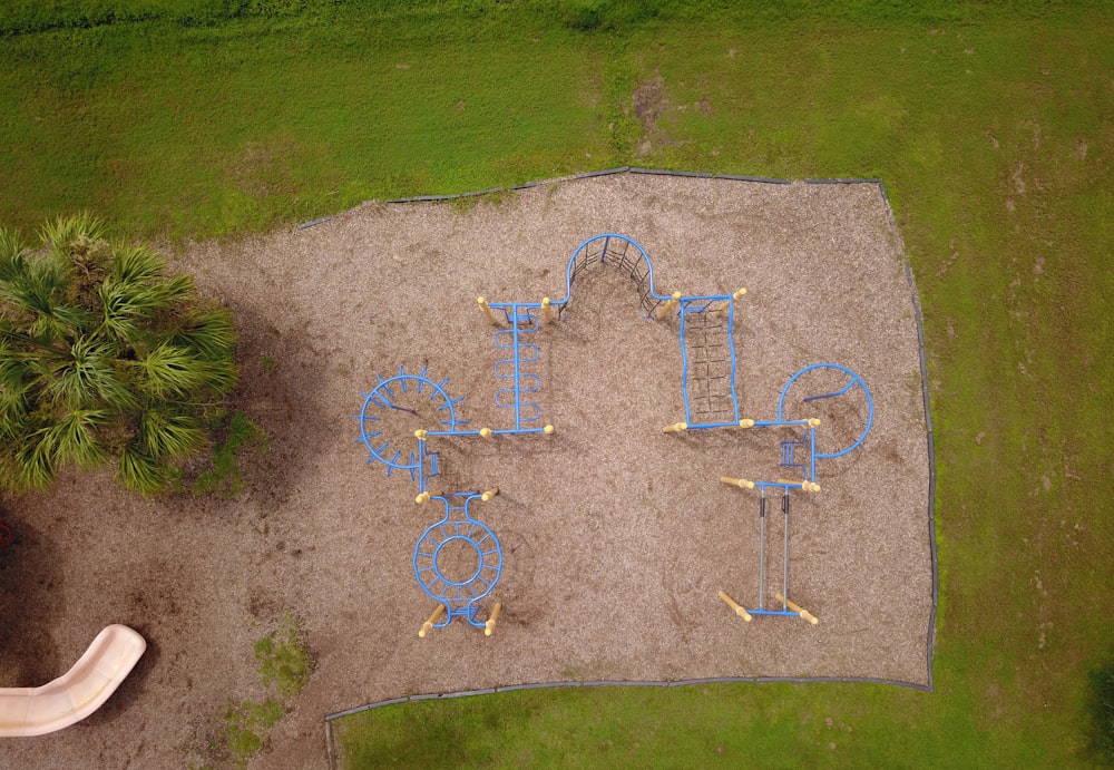 an aerial view of a playground in a park