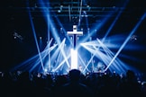 a group of people standing on top of a stage