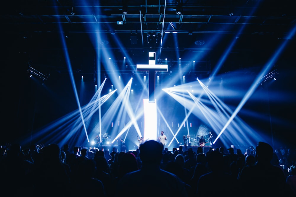 a group of people standing on top of a stage