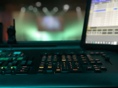 Close-up of a modern X-ray machine control panel with illuminated buttons.