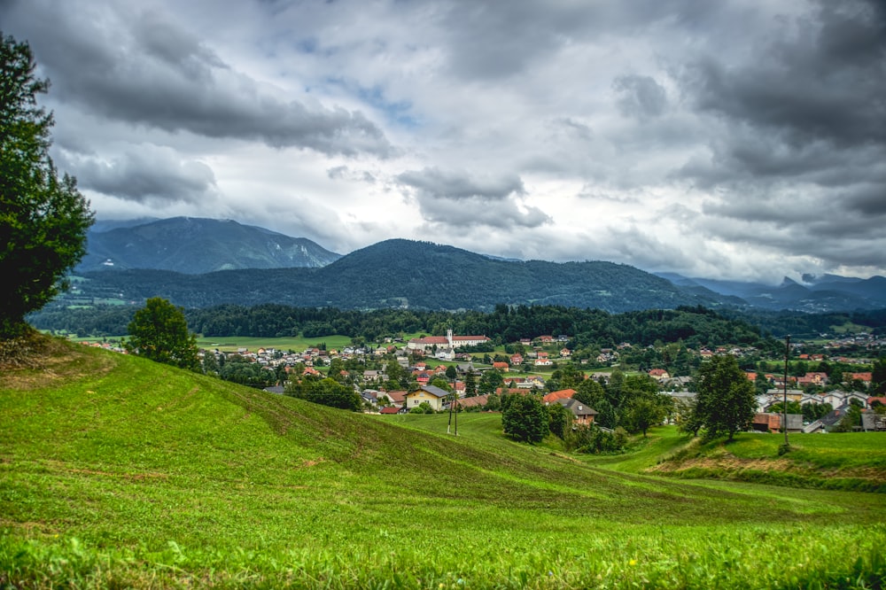 mountain range under cloudy sky