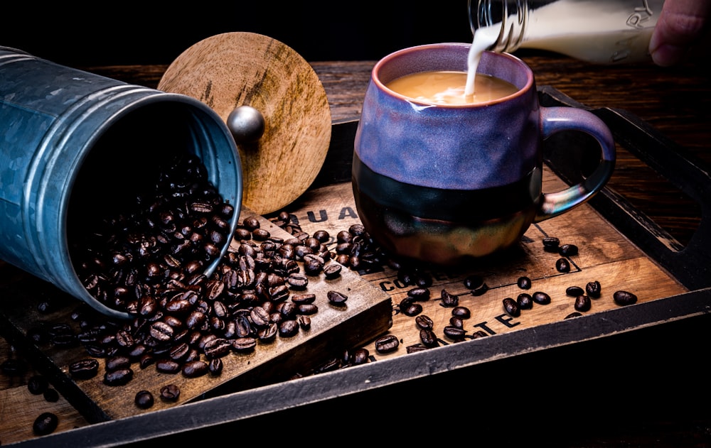 purple and black ceramic mug