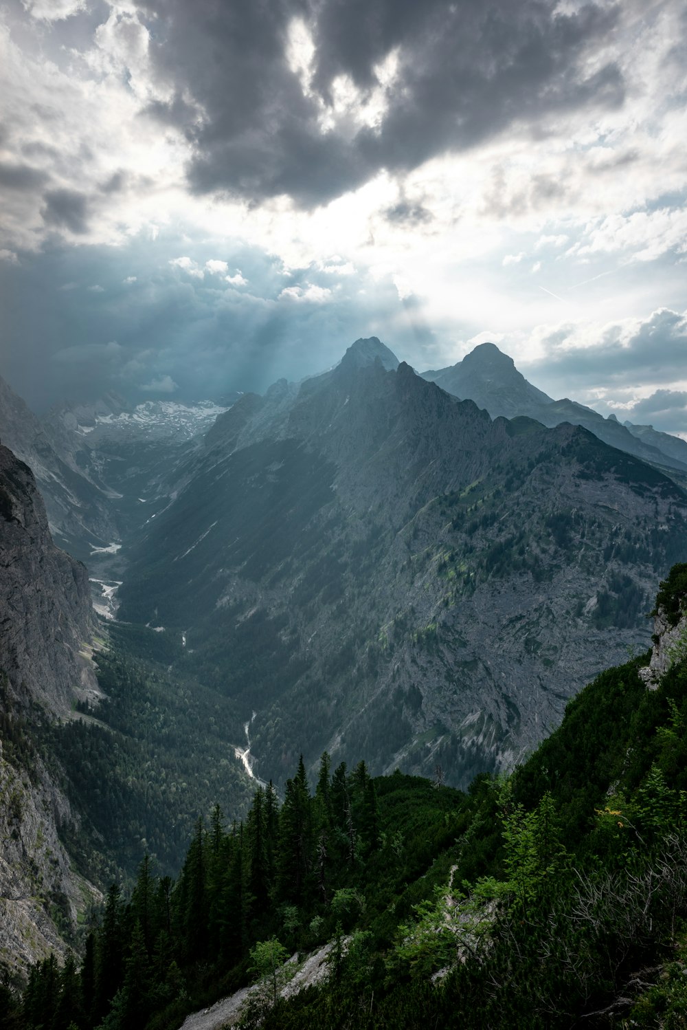 mountain under white and gray skies