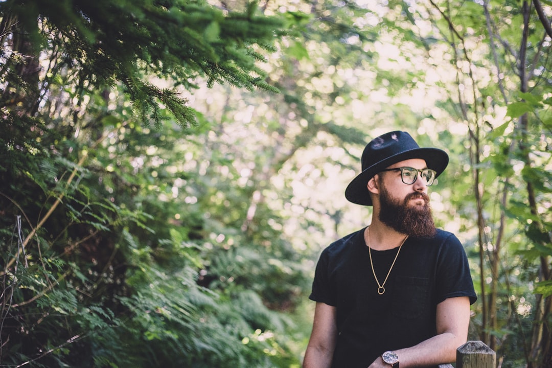 man wearing black hat