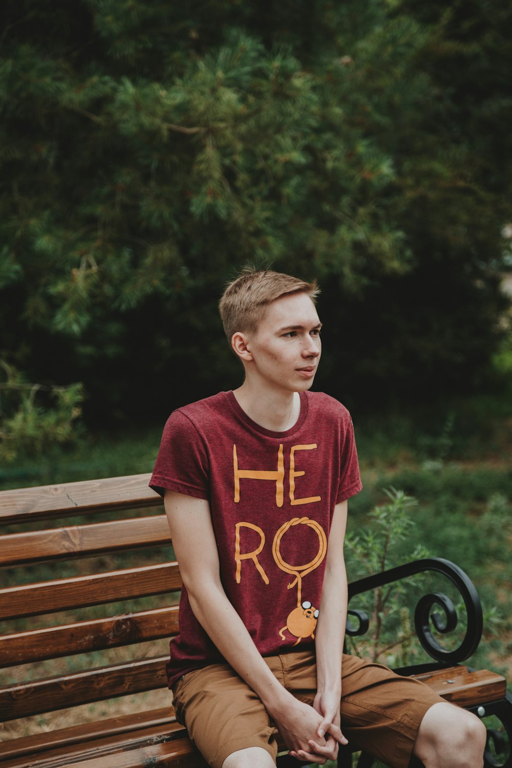 man sitting on bench