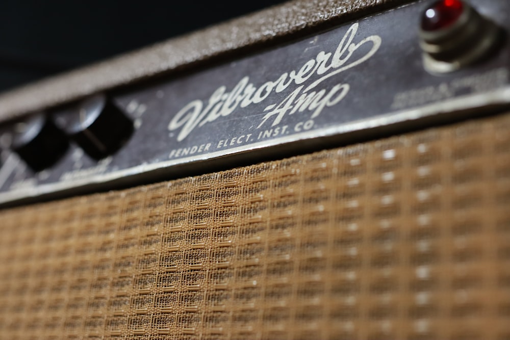 brown and black guitar amplifier