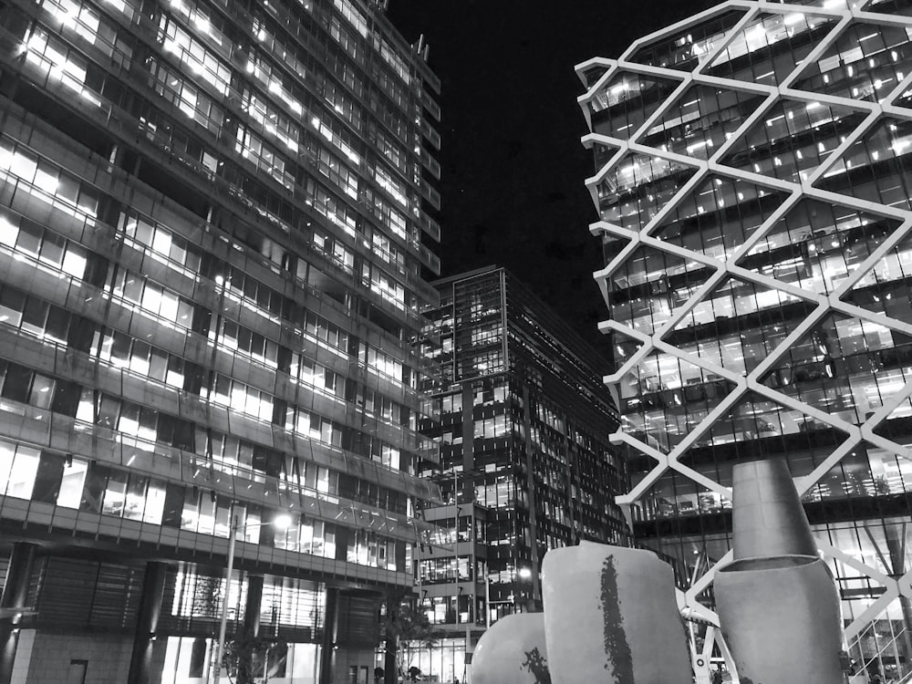 a black and white photo of a city at night