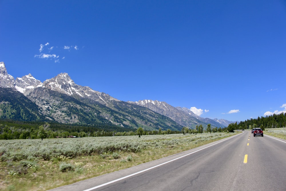 wide road near mountain