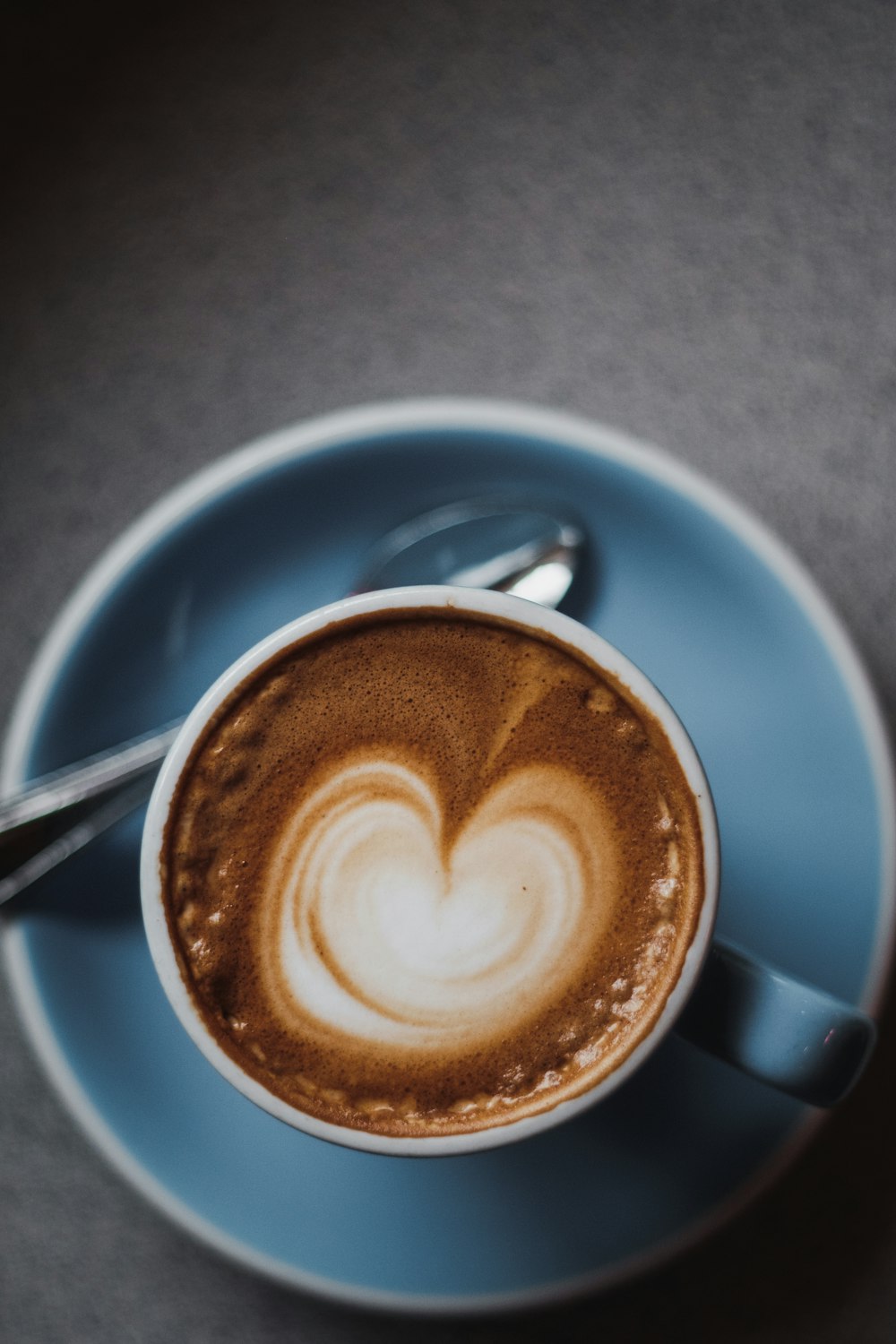 cappuccino in blue ceramic mug