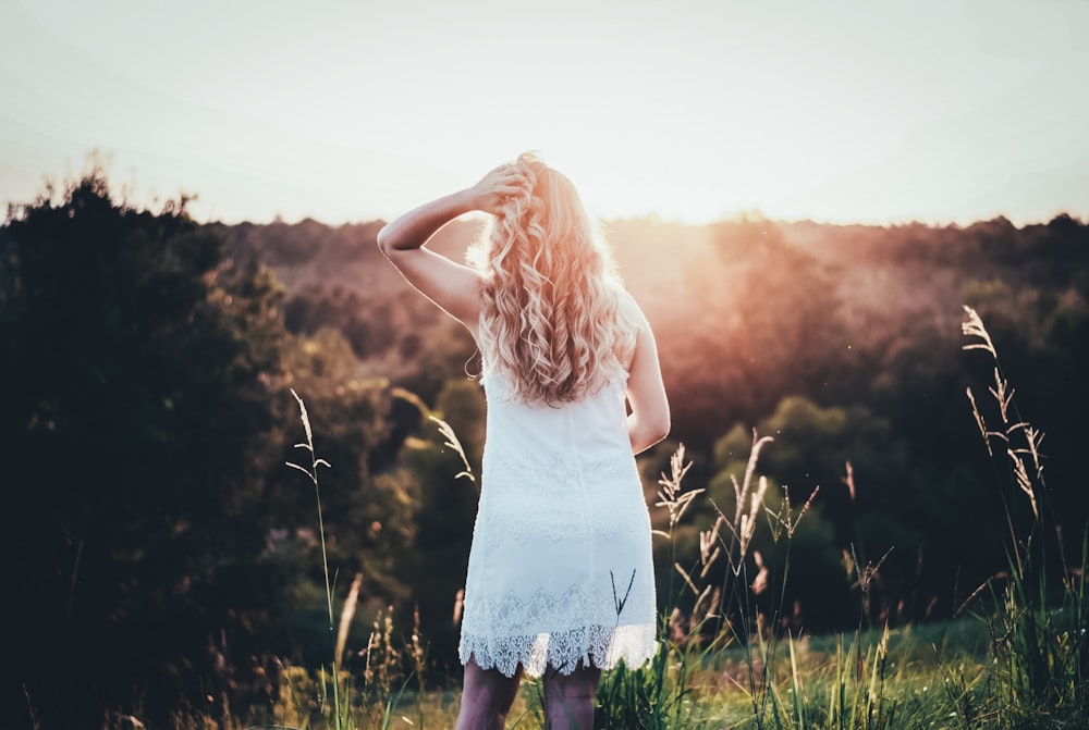 woman in white tank dress